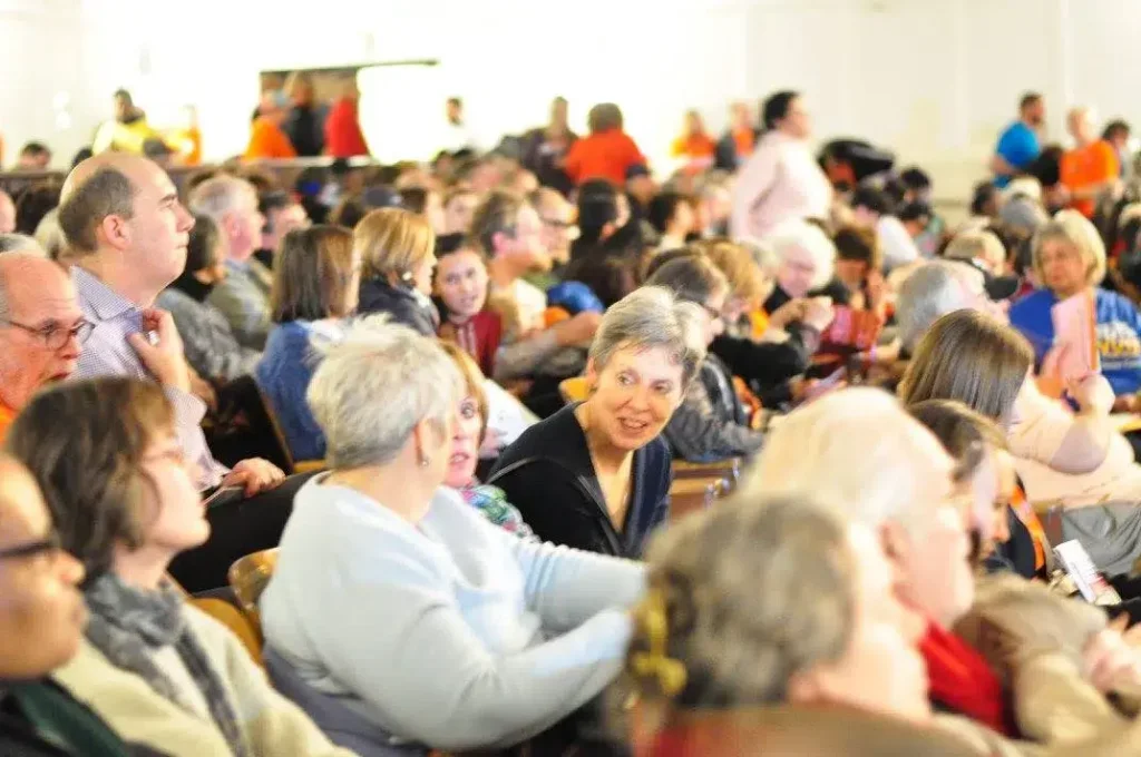 People Talking At Convention