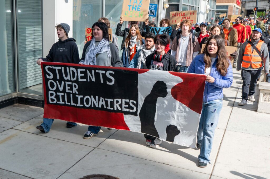 students over bllionaires may day march